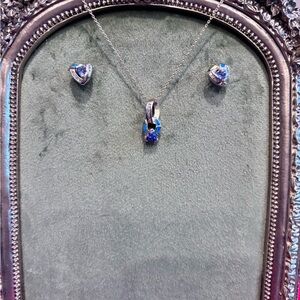 Elegant tanzanite, opa, diamond and 14k pendant and earring set.